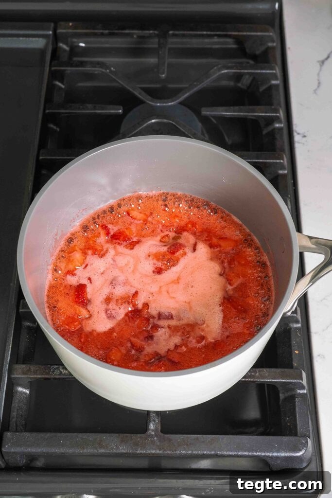 Homemade Small-Batch Strawberry Jam Recipe for Fresh Preserves 6 Boiling strawberry jam in a pot.