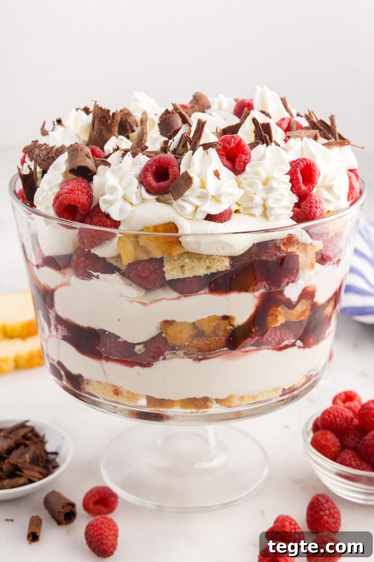 Decadent Raspberry Trifle Recipe with Fresh Cream and Cake 17 Photo of Raspberry Trifle with shaved chocolate and raspberries on the side
