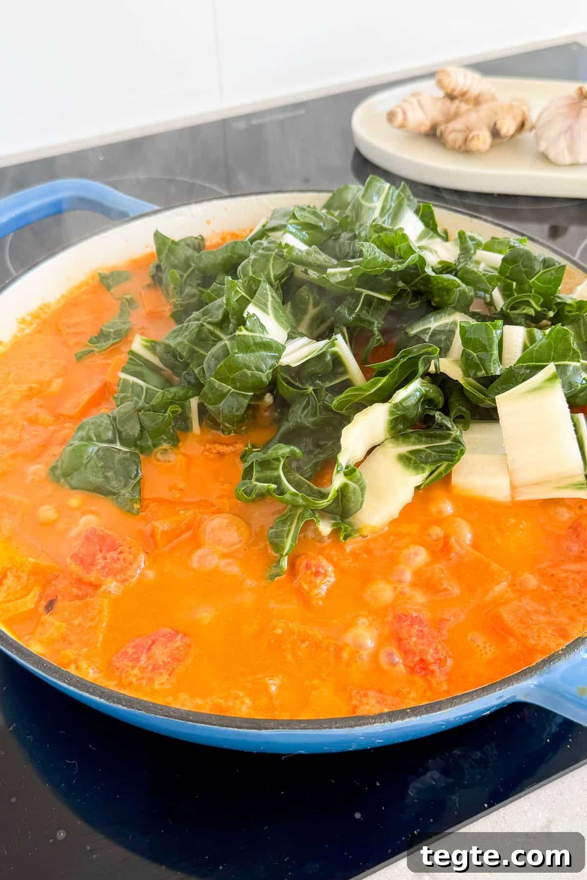Butternut Squash and Chickpea Curry Recipe for Cozy Dinners 8 Silverbeet added to the curry.