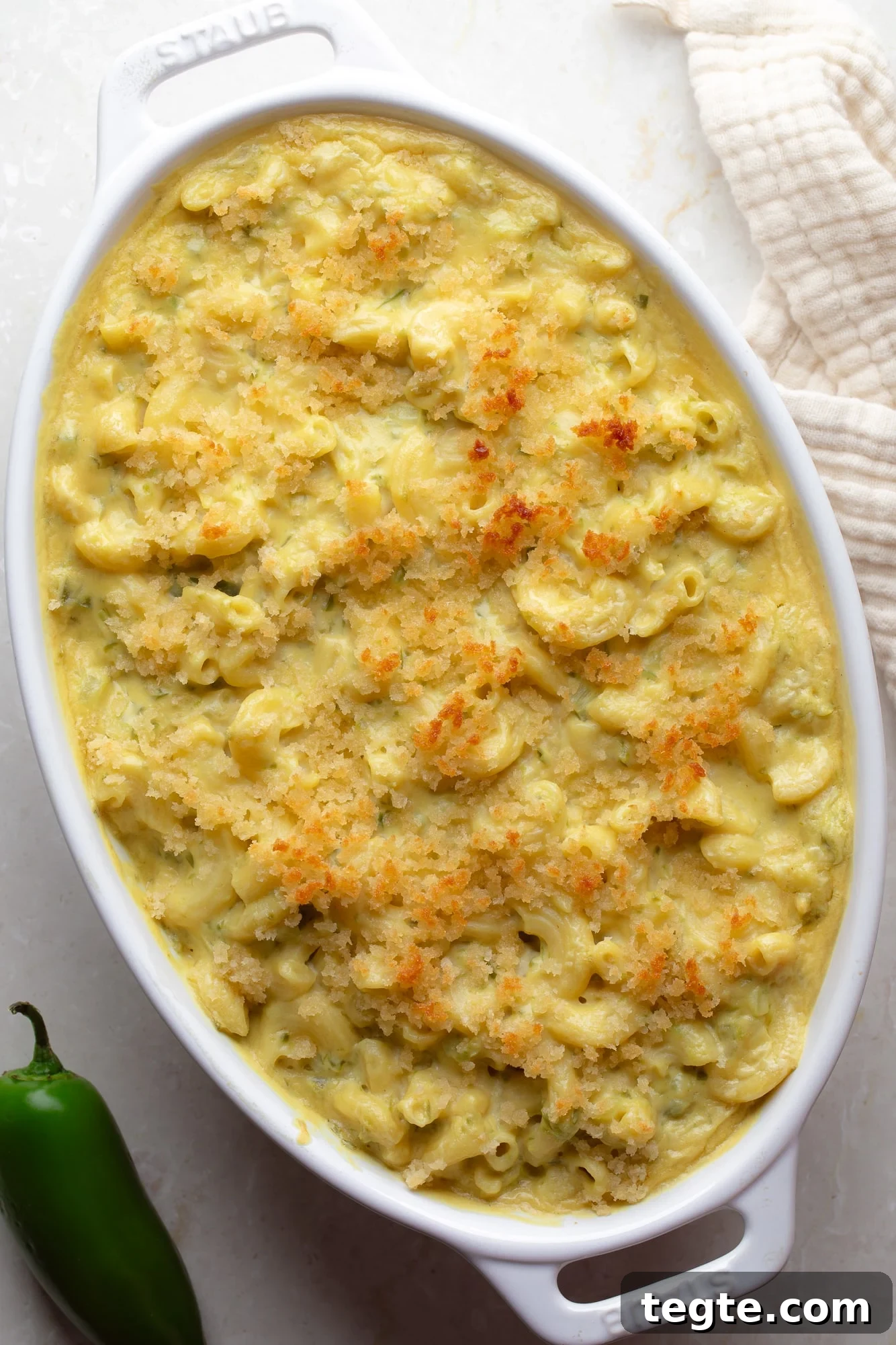 Creamy Vegan Jalapeño Mac and Cheese Recipe 8 overhead view of Vegan Jalapeño Mac and Cheese in a casserole dish.