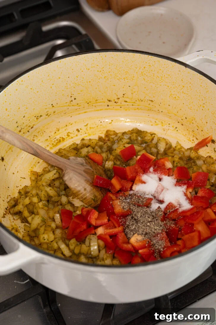 Authentic Puerto Rican Arroz con Pollo Recipe: Traditional Flavor Guide 7 A pot with onions, spices, and more.